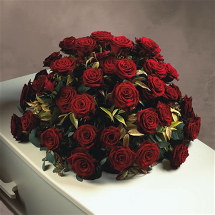 Rouwarrangement rode rozen